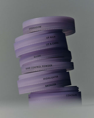 haphazard makeup stack layers stacked into a tower
