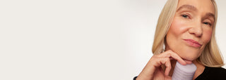 mature woman posing with her makeup stack
